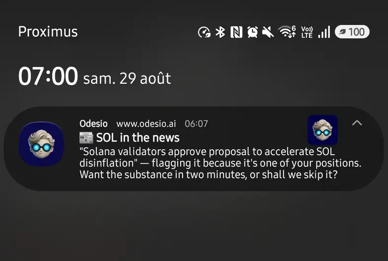 A phone's lock screen: a notification from Odesio flags a news item about one of the holdings and offers to go through it.